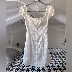 Off the shoulder white floral mini dress from Princess Polly